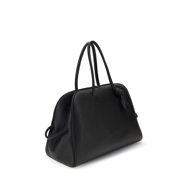 Black Calf Leather Bos Taurus HandbagThe Le Grand Tourisme Travel Bag by Jacquemus reinterprets the classic bowling bag in a modern and sophisticated key. Made of grained leather, it features a structured and functional design with a two-way zipper closur