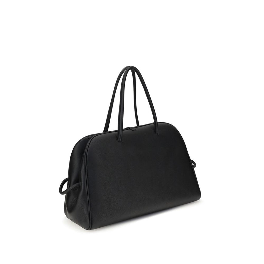 Black Calf Leather Bos Taurus HandbagThe Le Grand Tourisme Travel Bag by Jacquemus reinterprets the classic bowling bag in a modern and sophisticated key. Made of grained leather, it features a structured and functional design with a two-way zipper closur
