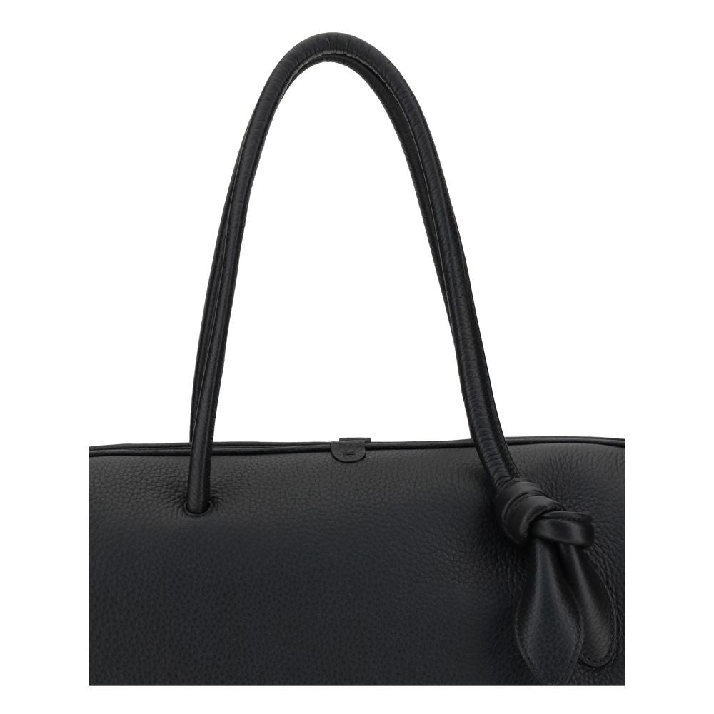 Black Calf Leather Bos Taurus HandbagThe Le Grand Tourisme Travel Bag by Jacquemus reinterprets the classic bowling bag in a modern and sophisticated key. Made of grained leather, it features a structured and functional design with a two-way zipper closur