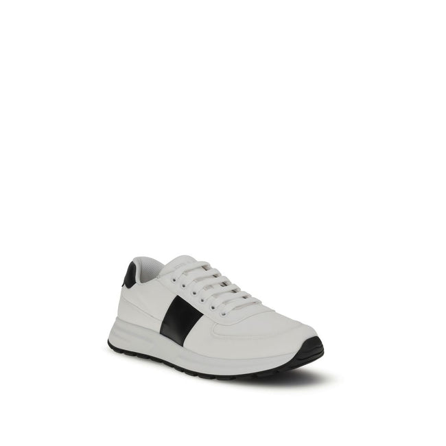 White Calf Leather Bos Taurus Low Top SneakersPrada’s leather Sneakers feature a two-tone design that combines elegance and contemporary style. Featuring a lace-up closure and reinforced toe for added durability, they are complemented by the logo on the b