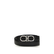 Black Calf Leather Bos Taurus Regular BeltThe Gancini reversible Belt combines versatility with contemporary style. The stitched strap lends a casual touch, while the palladium-finish buckle, with stylized double Gancini, adds elegance. Complemented by a