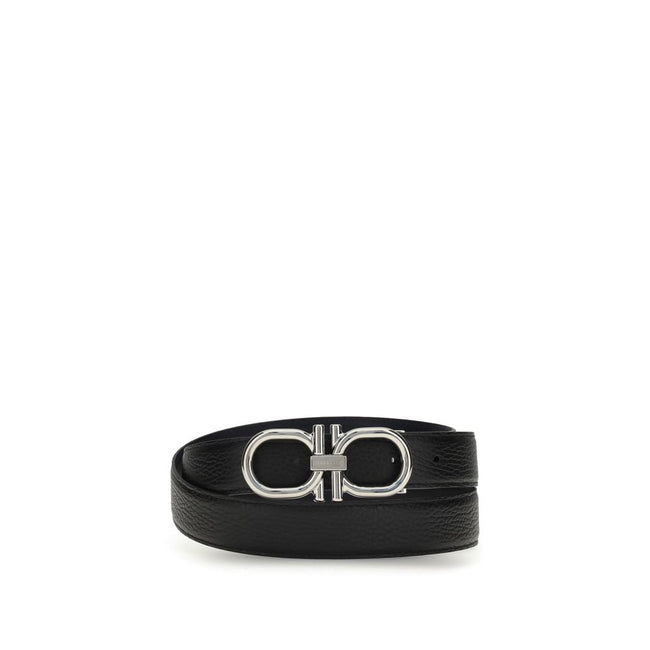 Black Calf Leather Bos Taurus Regular BeltThe Gancini reversible Belt combines versatility with contemporary style. The stitched strap lends a casual touch, while the palladium-finish buckle, with stylized double Gancini, adds elegance. Complemented by a