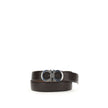 Brown Leather Regular BeltFerragamo’s Gancini Belt is a reversible, adjustable model designed for versatile elegance. The stitched rod lends a casual touch, while the ruthenium-finish buckle, with stylized double Gancini, adds character and sophistication