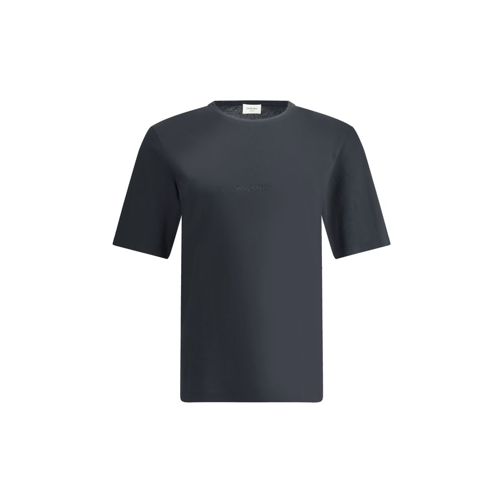 Black Cotton T-ShirtSaint Laurent’s cotton T-shirt is an essential and refined piece with a minimalist design. The ribbed crew neck ensures comfort, while the brand’s iconic tone-on-tone embroidered logo on the front adds a discreet yet distinctive touch