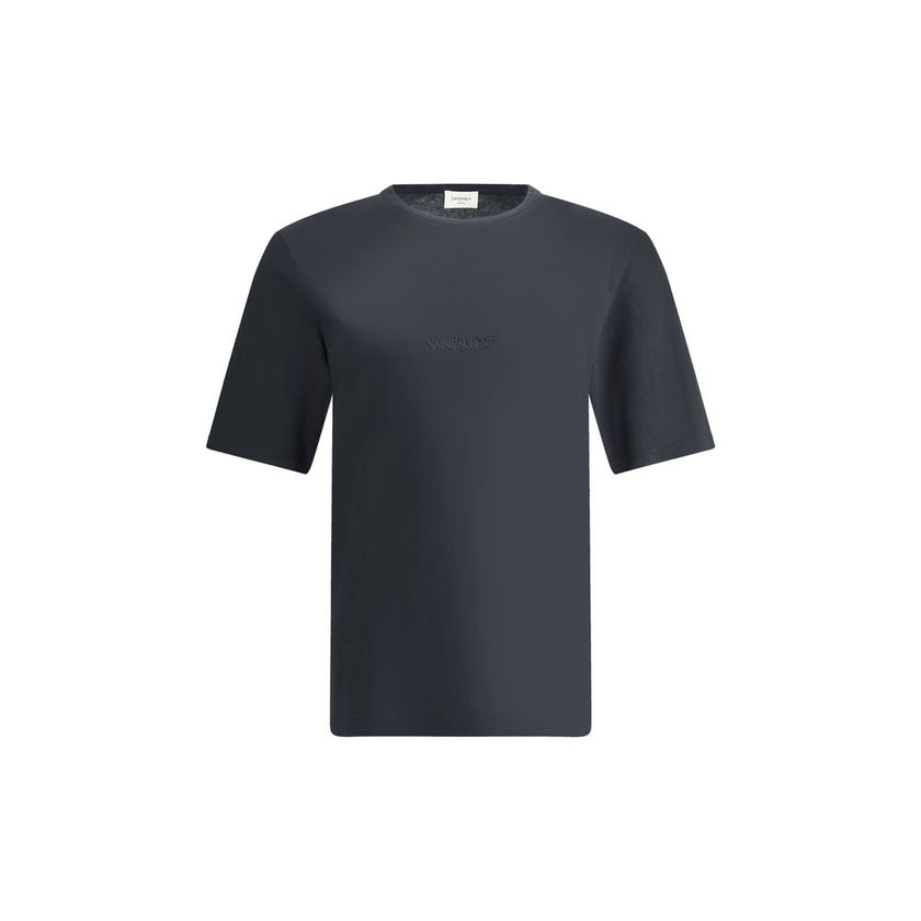 Black Cotton T-ShirtSaint Laurent’s cotton T-shirt is an essential and refined piece with a minimalist design. The ribbed crew neck ensures comfort, while the brand’s iconic tone-on-tone embroidered logo on the front adds a discreet yet distinctive touch