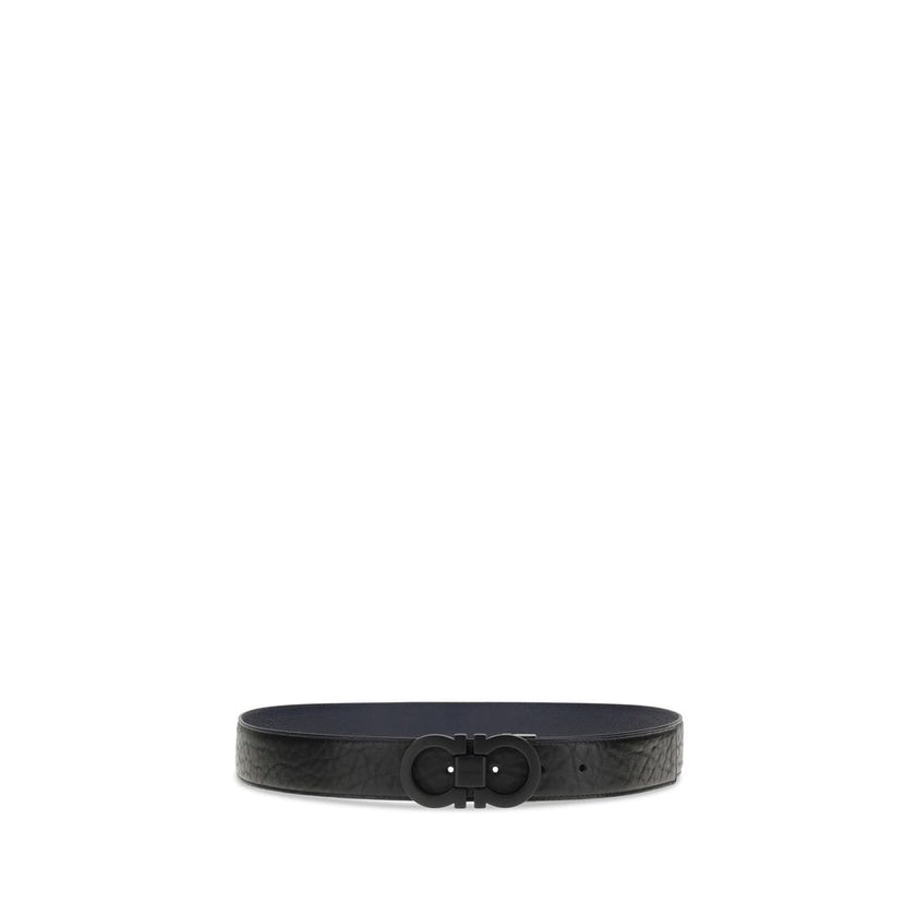 Blue Calf Leather Bos Taurus BeltFerragamo’s Gancini Belt is a reversible, adjustable model designed for versatile elegance. The stitched rod lends a casual touch, while the black-finish buckle, with stylized double Gancini, adds character and sophisticat