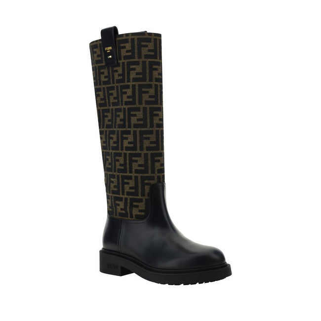 Leather BootsFendi’s Boots are distinguished by a round toe and leather details that add a touch of sophistication. The shaft is made of jacquard fabric with the iconic FF motif repeated all-over, a recognizable symbol of the maison. The rubber block heel