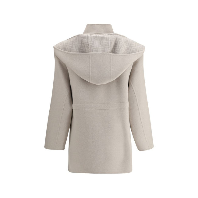 Cream Wool CoatFendi’s wool Coat is a stylish and versatile garment perfect for tackling the winter season in style. The removable hood and scarf add an extra touch of warmth and can be easily detached to fit different needs. The front zipper and button c