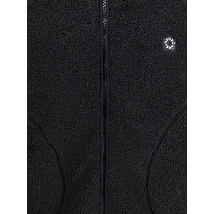 Black Polyester Full-Length JacketKenzo’s Boke Flower 2.0 fleece Jacket combines comfort and urban style in a practical and distinctive design. Made of soft fleece, it features a hood and front closure with a double-slider zipper, which ensures functional