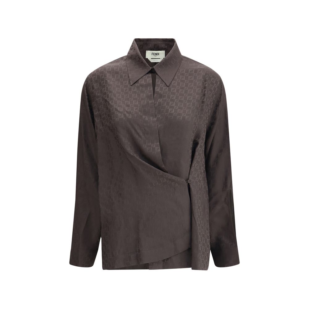 Brown Silk Dress ShirtFendi’s Silk jacquard Shirt is a sophisticated garment that expresses the distinctive elegance of the fashion house. Made of fine jacquard-textured silk, it is embellished with the FF motif embroidered across the surface for a refine