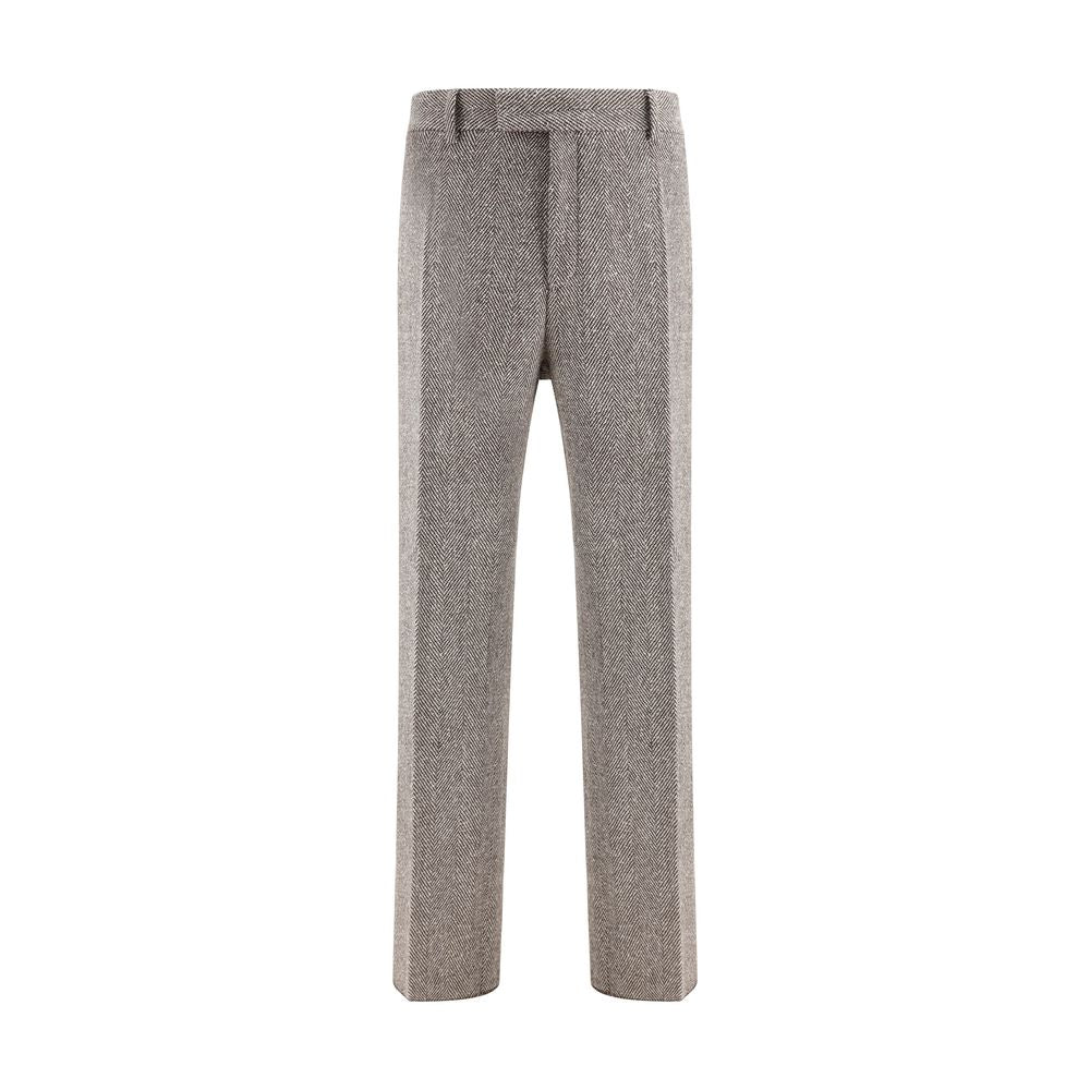 Gray Fleece Wool Casual PantsFerragamo’s wide chevron Pants recalls the timeless elegance of the 1920s with a refined, flowing silhouette. Crafted with tailored construction, it features a wide leg with an ironed crease that enhances the movement of the f
