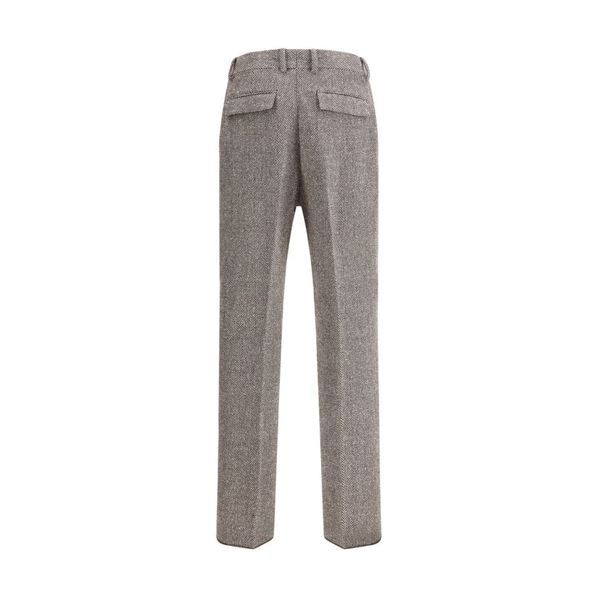Gray Fleece Wool Casual PantsFerragamo’s wide chevron Pants recalls the timeless elegance of the 1920s with a refined, flowing silhouette. Crafted with tailored construction, it features a wide leg with an ironed crease that enhances the movement of the f