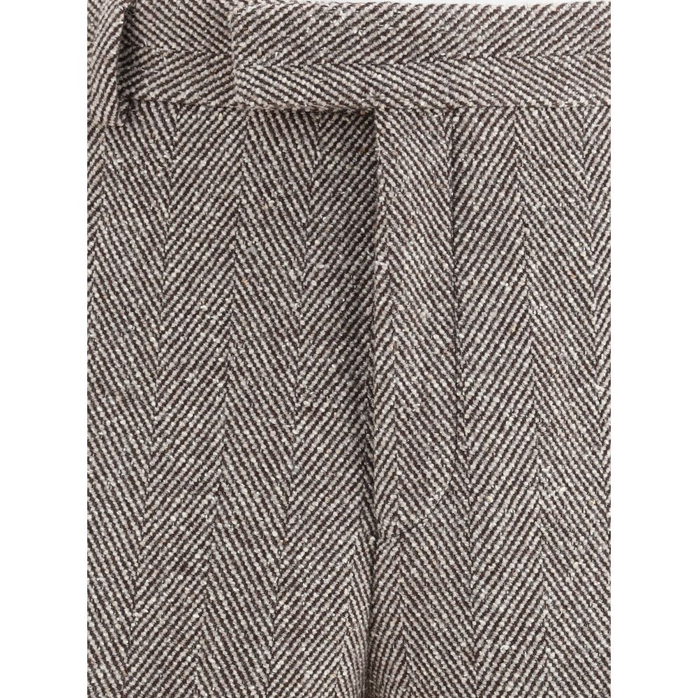 Gray Fleece Wool Casual PantsFerragamo’s wide chevron Pants recalls the timeless elegance of the 1920s with a refined, flowing silhouette. Crafted with tailored construction, it features a wide leg with an ironed crease that enhances the movement of the f