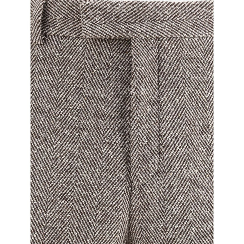 Gray Fleece Wool Casual PantsFerragamo’s wide chevron Pants recalls the timeless elegance of the 1920s with a refined, flowing silhouette. Crafted with tailored construction, it features a wide leg with an ironed crease that enhances the movement of the f