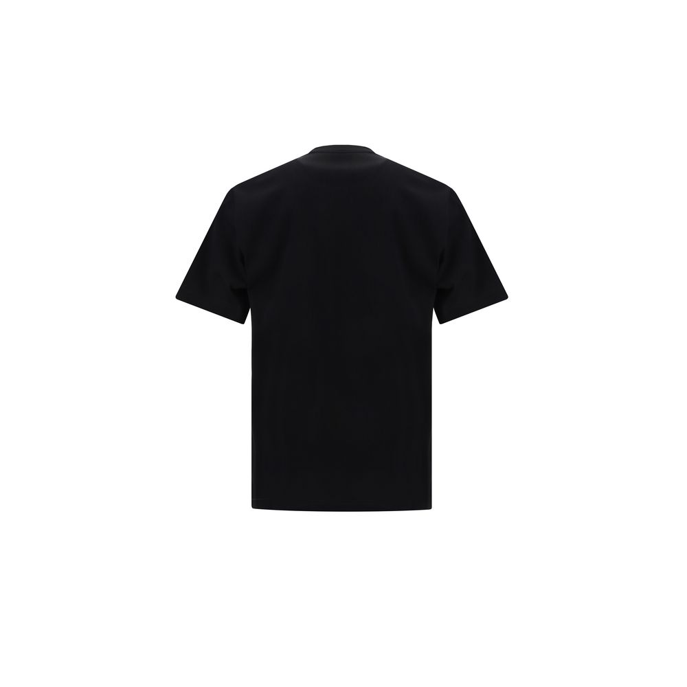 T-shirt with pocketCotton T-Shirt by Fendi features a crew neck and regular fit for optimal comfort. On the front, a zippered patch pocket is embellished with the brand’s iconic contrasting monogram, adding a distinctive detail. The monochrome pattern giv