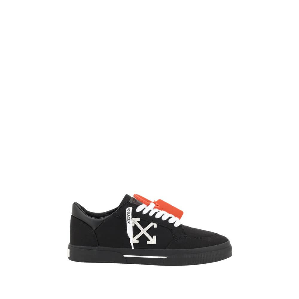 New Low Vulcanized SneakersCotton New Low Vulcanized Sneakers by Off-White feature a lace-up front closure and a round toe. The side panels are decorated with the brand’s iconic Arrow logo, while the flat sole ensures comfort. A distinctive detail is the