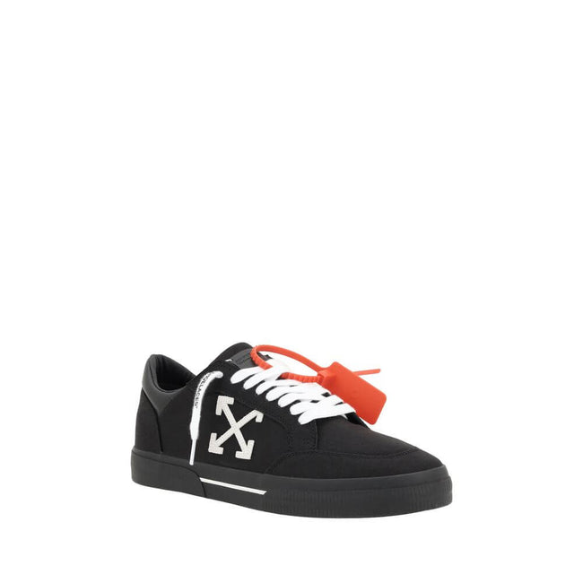 New Low Vulcanized SneakersCotton New Low Vulcanized Sneakers by Off-White feature a lace-up front closure and a round toe. The side panels are decorated with the brand’s iconic Arrow logo, while the flat sole ensures comfort. A distinctive detail is the
