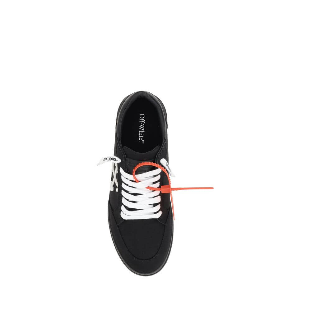 New Low Vulcanized SneakersCotton New Low Vulcanized Sneakers by Off-White feature a lace-up front closure and a round toe. The side panels are decorated with the brand’s iconic Arrow logo, while the flat sole ensures comfort. A distinctive detail is the