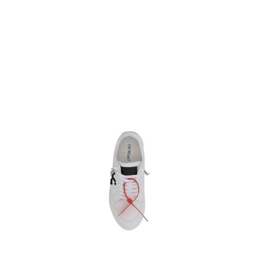 White Rubber Low Top SneakersCotton New Low Vulcanized Sneakers by Off-White feature a lace-up front closure and a round toe. The side panels are decorated with the brand’s iconic Arrow logo, while the flat sole ensures comfort. A distinctive detail is th