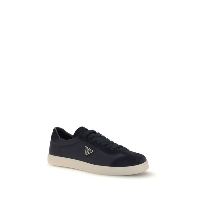 Blue Leather SneakersLeather Sneakers by Prada combine contemporary style with everyday comfort. Featuring a flat rubber sole and round toe, they are distinguished by the iconic triangular side-applied plaque and tone-on-tone logo on the back, adding a di