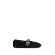Black Fur Ballet FlatsFerragamo’s Gancini-embellished Ballerinas by Ferragamo reinterprets a classic with a playful, contemporary twist. Featuring a contoured neckline and soft silhouette, it is distinguished by a curly shearling lining, ideal for the col
