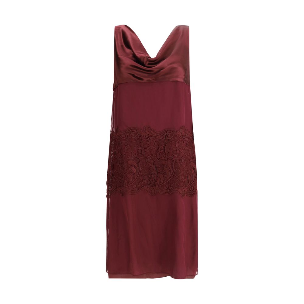 Bordeaux Silk Cocktail DressFerragamo’s Draped Dress is a refined contemporary reinterpretation of 1920s elegance. Made of a blend of silk chiffon, satin, and embroidery, it is distinguished by wide bands that wrap the silhouette harmoniously. The draped