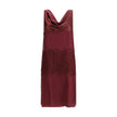 Bordeaux Silk Cocktail DressFerragamo’s Draped Dress is a refined contemporary reinterpretation of 1920s elegance. Made of a blend of silk chiffon, satin, and embroidery, it is distinguished by wide bands that wrap the silhouette harmoniously. The draped