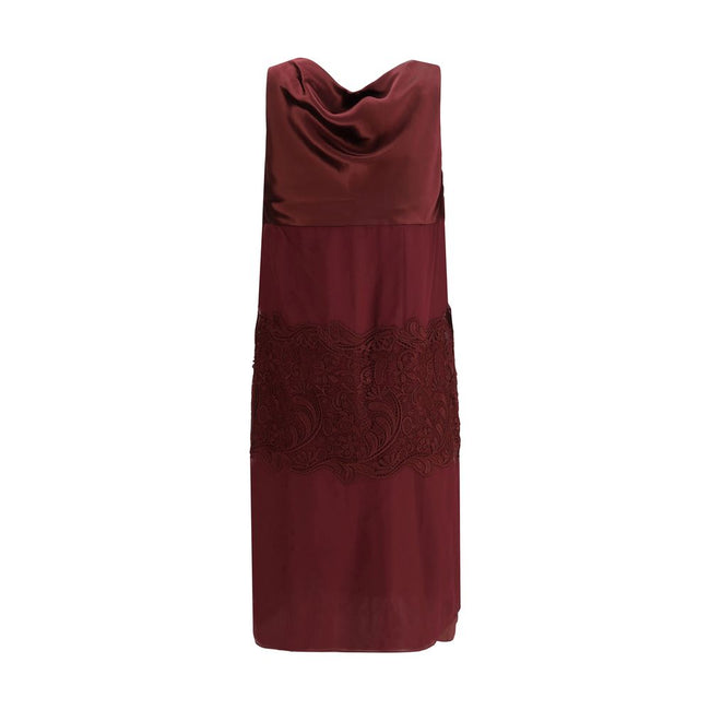 Bordeaux Silk Cocktail DressFerragamo’s Draped Dress is a refined contemporary reinterpretation of 1920s elegance. Made of a blend of silk chiffon, satin, and embroidery, it is distinguished by wide bands that wrap the silhouette harmoniously. The draped