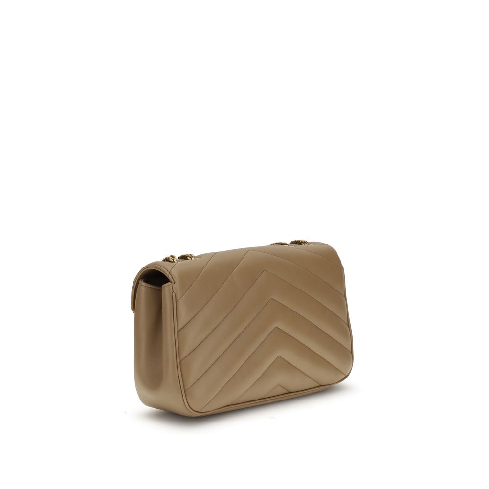 Beige Calf Leather Bos Taurus Shoulder BagThe LouLou Shoulder Bag by Saint Laurent is an icon of timeless elegance. Crafted with the unmistakable quilted design, it features a front closure with magnetic flap embellished with the brass logo applied on the