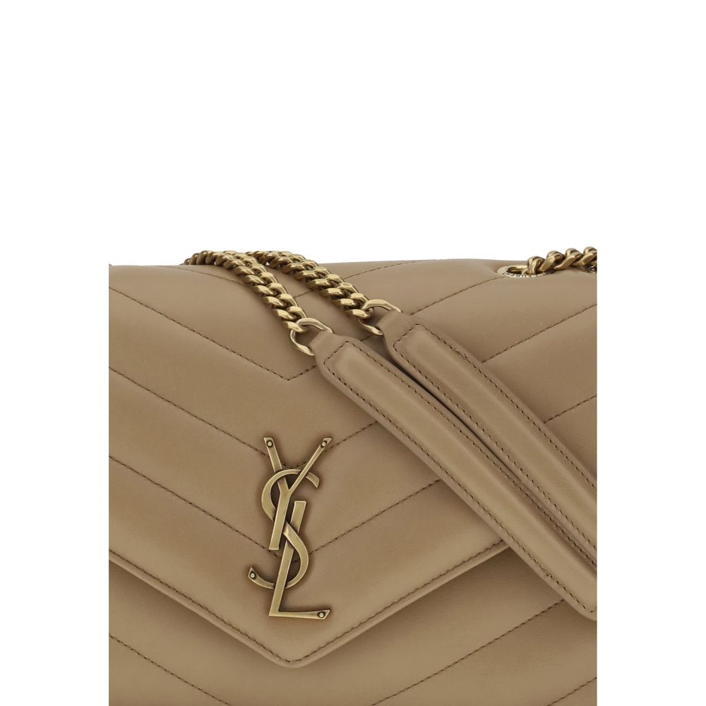 Beige Calf Leather Bos Taurus Shoulder BagThe LouLou Shoulder Bag by Saint Laurent is an icon of timeless elegance. Crafted with the unmistakable quilted design, it features a front closure with magnetic flap embellished with the brass logo applied on the