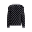Black Wool CardiganGucci’s GG Supreme reversible Cardigan is made of fine wool tubular jacquard in shades of black and white with the iconic GG pattern. Featuring a V-neckline, low shoulders and long sleeves, it has two front pockets and ribbed trim. A ve