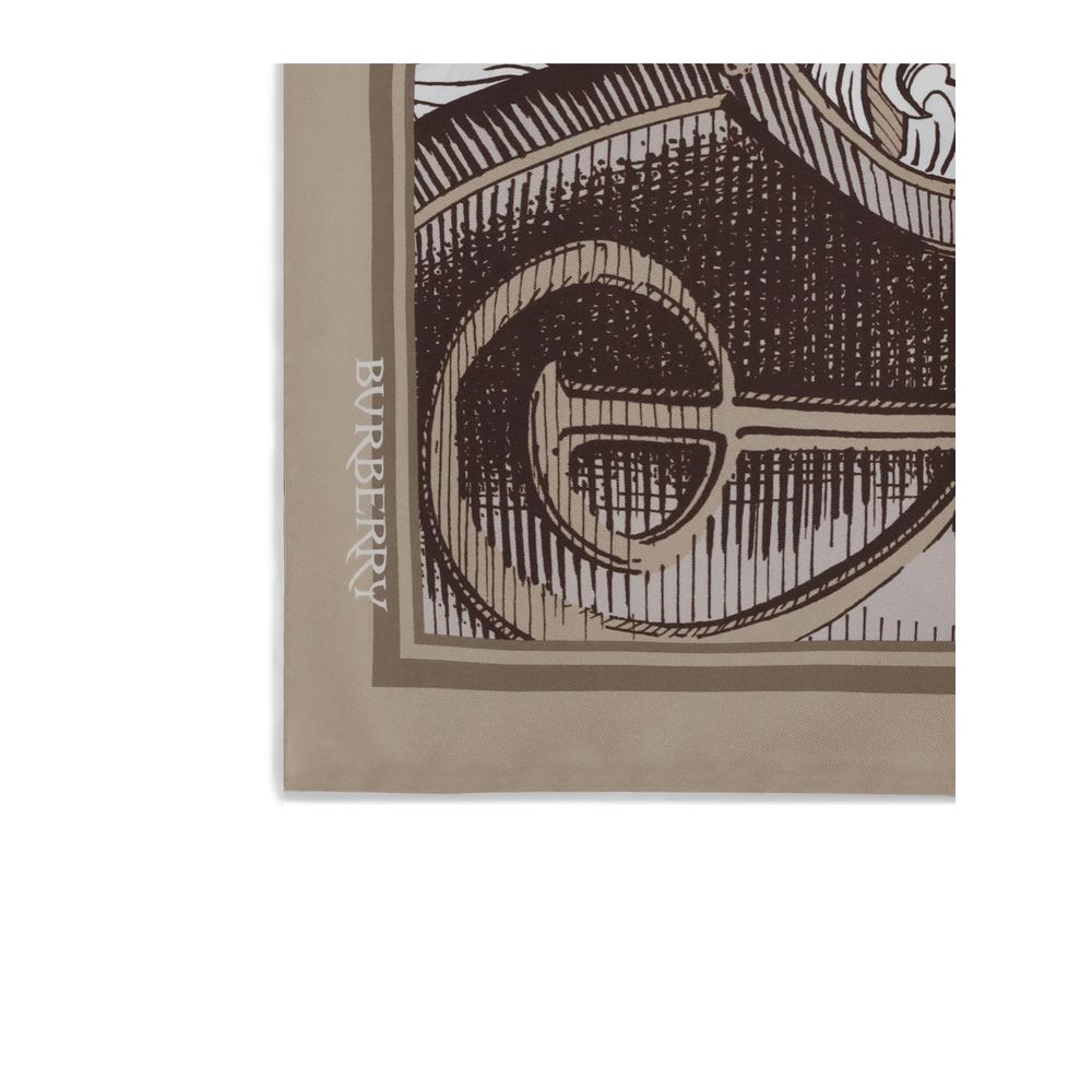Beige Silk ScarfBurberry’s Knight Engraving print silk Scarf is a fine accessory, made in Italy from silk twill. The print, hand-drawn in an antique engraving style, depicts details of the iconic Equestrian Knight Design, with the knight’s armor alongside