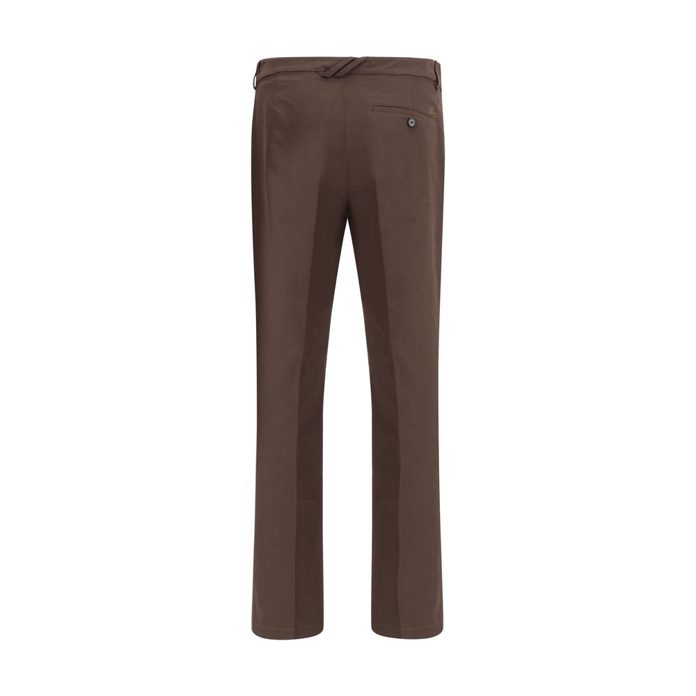 Brown Cotton Chino PantsBurberry’s cotton chino Pants reinterpret a wardrobe classic with iconic details from the house. Made of cotton twill with a slim fit, they feature a button and zipper closure, side pouch pockets and a buttoned welt pocket on the b