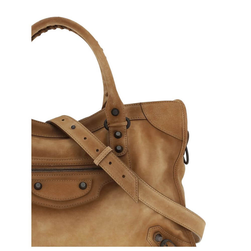 Beige Calf Leather Bos Taurus HandbagBalenciaga’s Le City medium Handbag, crafted in suede with a waxed effect, embodies elegance with a strong character. Featuring two hand-woven leather handles, it has a removable and adjustable shoulder strap for added