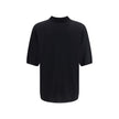 Black Wool Polo ShirtSaint Laurent’s wool polo Shirt is a garment with understated and refined appeal. Featuring a ribbed collar and a three-button front closure, it has ribbed finished hems that complement its structure with elegance. A timeless classic,