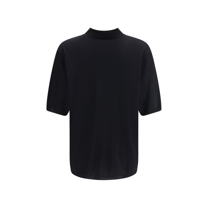 Black Wool Polo ShirtSaint Laurent’s wool polo Shirt is a garment with understated and refined appeal. Featuring a ribbed collar and a three-button front closure, it has ribbed finished hems that complement its structure with elegance. A timeless classic,