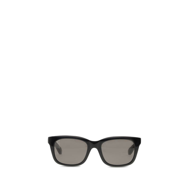 Black Acetate SunglassesSunglasses by Balenciaga are made of acetate and feature a square, modern and distinctive shape. On the side is the brand’s signature, a detail that emphasizes its exclusivity. The lenses are made of Bio-Nylon, an innovative materi