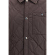 Brown Polyamide CoatBurberry’s Reversible quilted Jacket is a smock made of lightweight, water-resistant nylon with one side in solid color and the other in Burberry Check cotton twill. It features a regular fit and snap button closure with embossed logo.