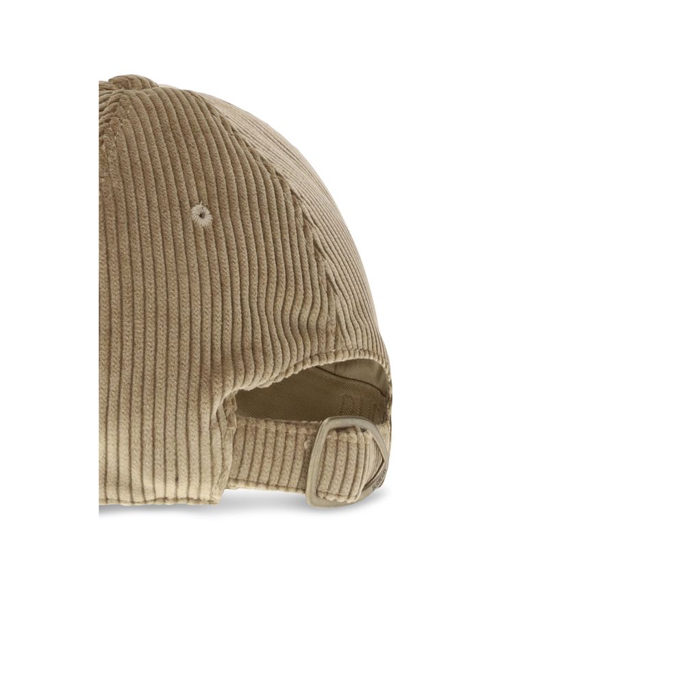 Beige Cotton Cap (Baseball Hat)Burberry’s corduroy Baseball Hat is a classically styled accessory with a distinctive twist. Made in Italy from corduroy, it is embellished with a shield-shaped buckle with an antiqued finish and engraved Burberry lettering.