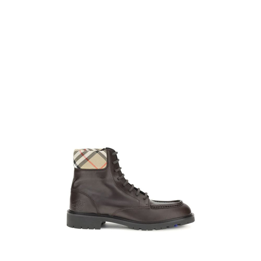 Brown Calf Leather Bos Taurus Lace-Up BootsBurberry’s Rogue amphibious Ankle Boots combine functionality with iconic details. Crafted in a rugged silhouette, they are decorated with the Equestrian Knight Design embossed on the side and complemented by a p