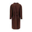 Brown Wool CoatGucci’s silk and wool reversible Coat is a refined and versatile piece, perfect for enhancing any look with a distinctive touch. Made of brown silk wool on one side and brown and light pink GG patterned silk wool on the other, it offers two