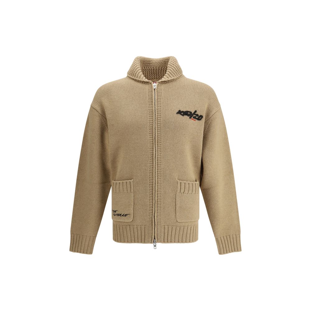 Beige Wool CardiganKenzo’s Futura zippered Cardigan is a knitted wool garment from the Kenzo x Futura 2000 collaboration. Featuring a shawl collar and a practical double-slider zipper, it has two front pockets and a striking graphic on the back that fuses