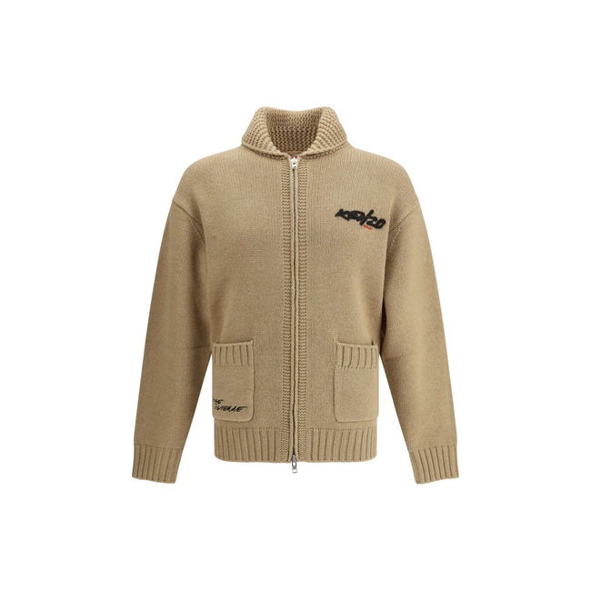 Beige Wool CardiganKenzo’s Futura zippered Cardigan is a knitted wool garment from the Kenzo x Futura 2000 collaboration. Featuring a shawl collar and a practical double-slider zipper, it has two front pockets and a striking graphic on the back that fuses