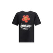 Black Cotton T-ShirtKenzo’s Futura 2000 cotton T-Shirt is made of lightweight jersey and features striking graphics combining the Boke Flower and the atom, iconic symbols of the artist. Completing the design are Kenzo Paris and 18 Rue Vivienne prints in g