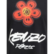 Black Cotton T-ShirtKenzo’s Futura 2000 cotton T-Shirt is made of lightweight jersey and features striking graphics combining the Boke Flower and the atom, iconic symbols of the artist. Completing the design are Kenzo Paris and 18 Rue Vivienne prints in g