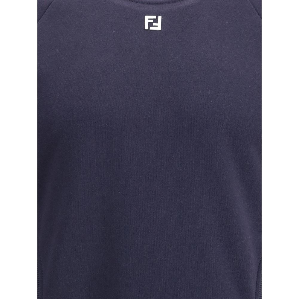 Blue Cotton SweatshirtFendi’s jersey Sweatshirt combines comfort and style in a contemporary design. Featuring a ribbed crew neck, hem and cuffs, it has two practical front welt pockets and a logo ball on the front, an iconic detail that signs the garment
