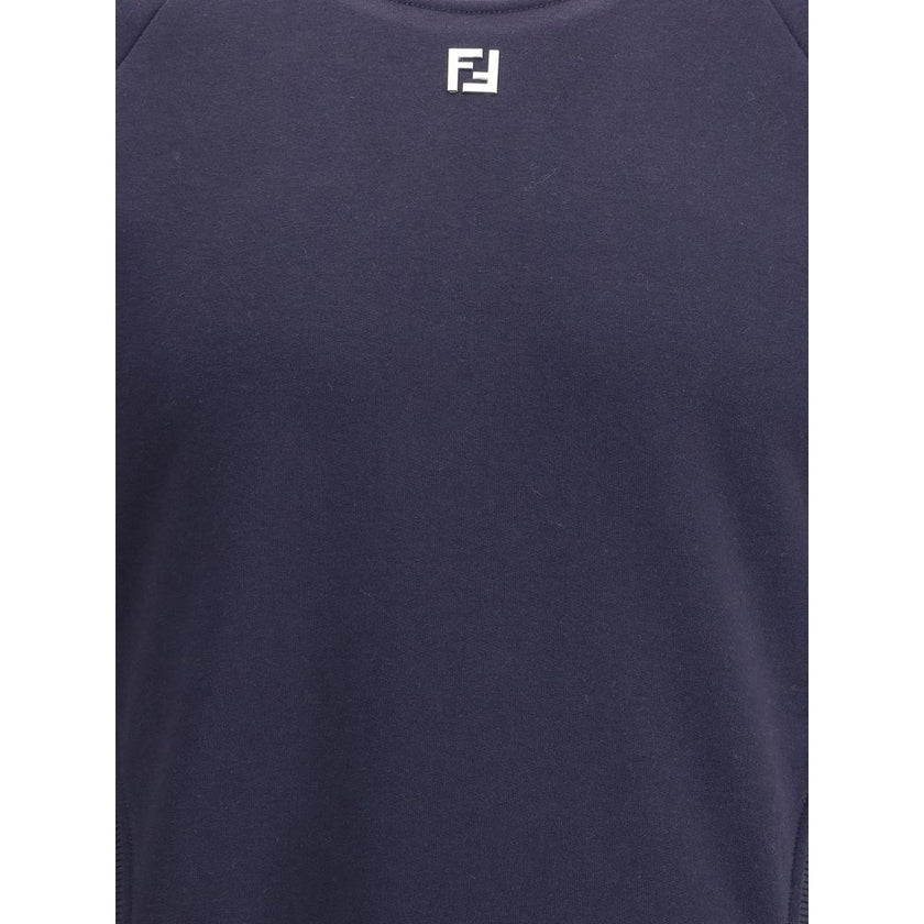Blue Cotton SweatshirtFendi’s jersey Sweatshirt combines comfort and style in a contemporary design. Featuring a ribbed crew neck, hem and cuffs, it has two practical front welt pockets and a logo ball on the front, an iconic detail that signs the garment