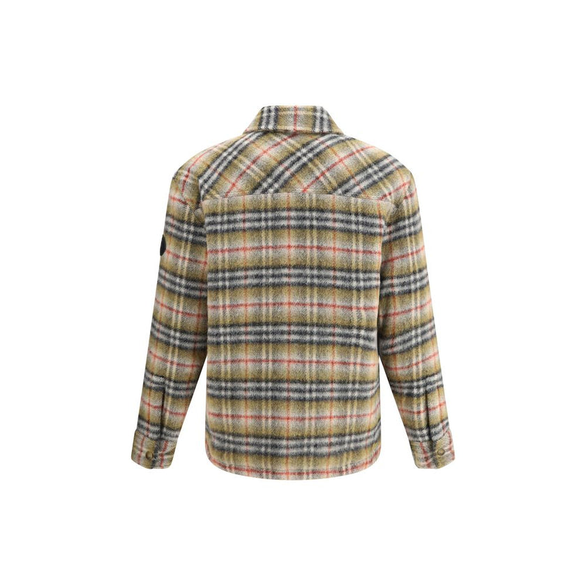 Multicolor Wool CoatBurberry’s Check wool Jacket features a classic collar and a front snap-button closure. Featuring the iconic check pattern, it is completed with a patch pocket on the front for a timeless look with British style. Season: AW25 Fit: Slim