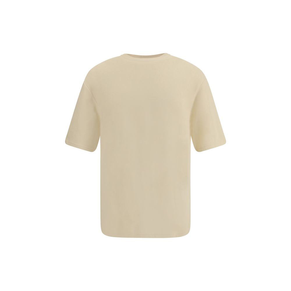 Cotton T-ShirtJacquemus’ cotton T-Shirt is an essential garment reinterpreted with the brand’s unmistakable style. Featuring an oversized cut, it offers a relaxed and contemporary fit, ideal for casual looks with a strong character. The ribbed crew neck e