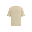 Cotton T-ShirtJacquemus’ cotton T-Shirt is an essential garment reinterpreted with the brand’s unmistakable style. Featuring an oversized cut, it offers a relaxed and contemporary fit, ideal for casual looks with a strong character. The ribbed crew neck e